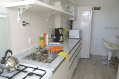 Kitchen seen from laundry window